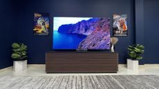 Samsung QN900D on stand in living room