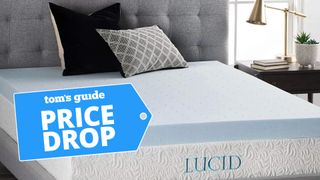 The Lucid Gel Memory Foam Topper in a well-lit bedroom with a Labor Day price drop badge